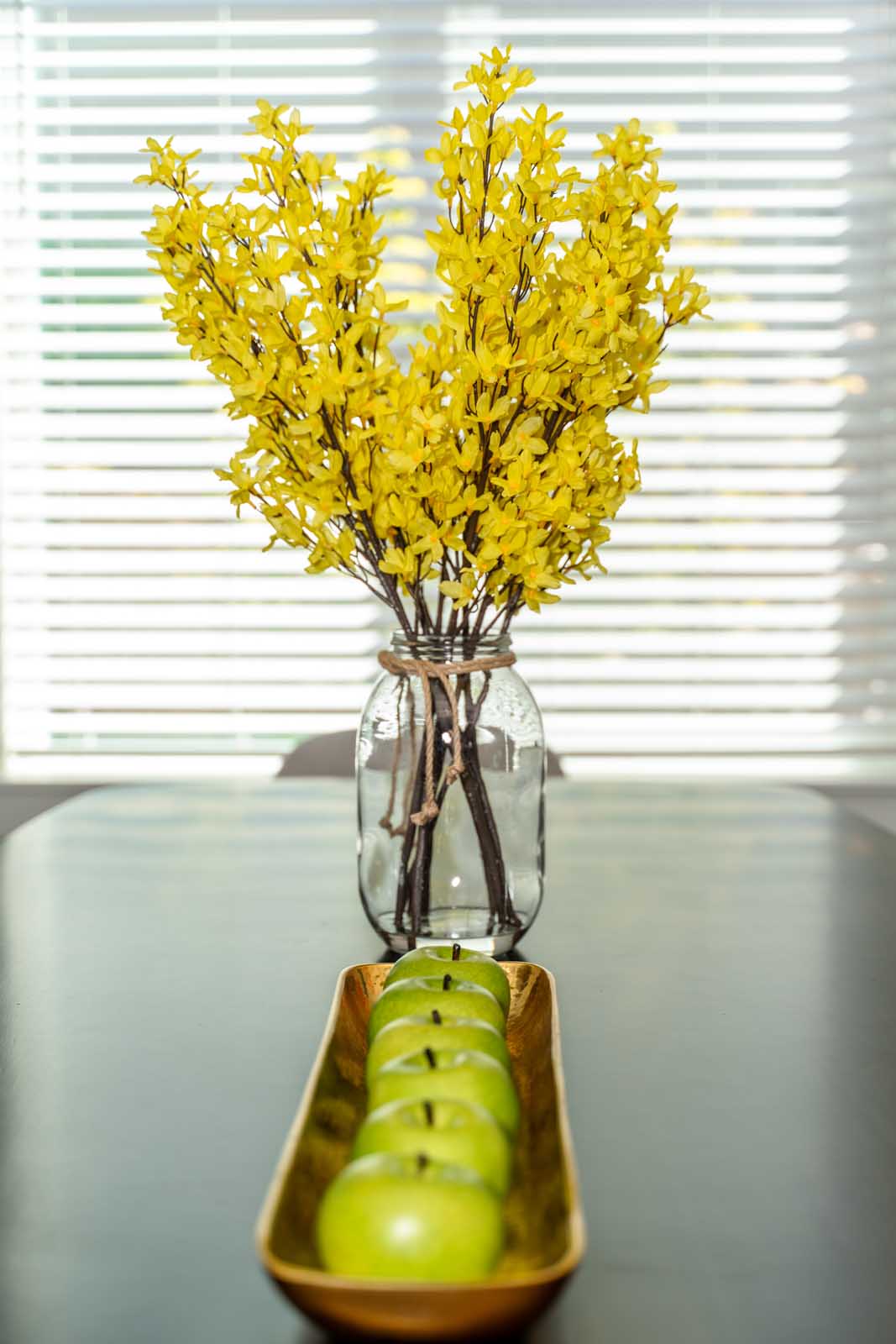 Yellow Flowers in glass vessel
