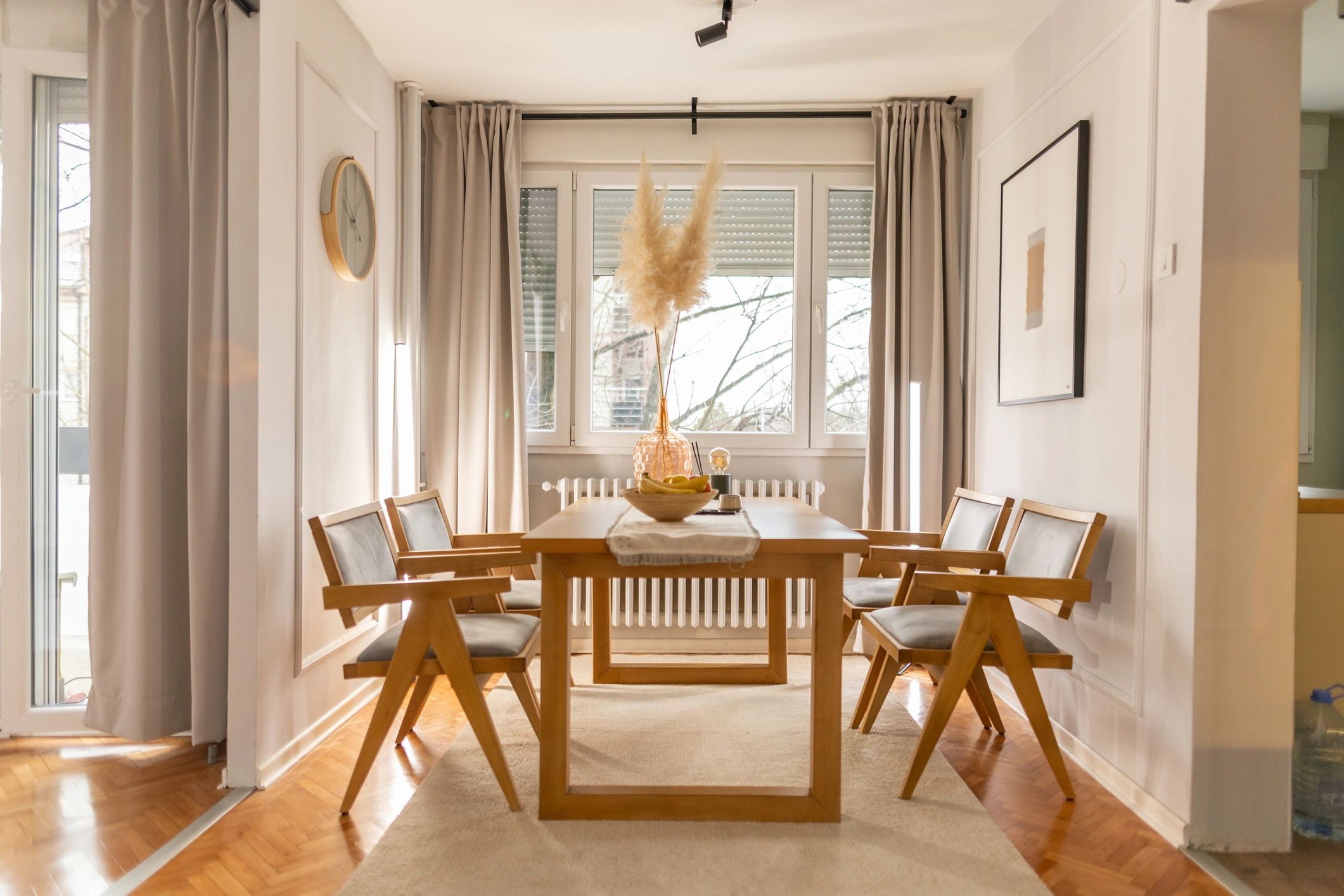 Elegant staged dining room with soft neutral palette
